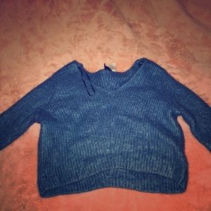 A blue sweater croptop